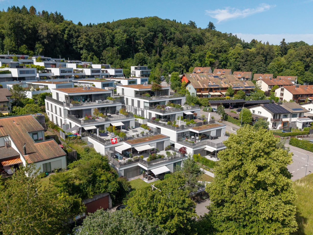 Aerial — hillside terraced residences, Aargau